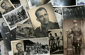 Photographs of World War II veteran Aleksander Szekal and his unit are displayed at his home in the village of Ivyanets, northwest of Minsk, Belarus, Wednesday, Dec. 17, 2008.