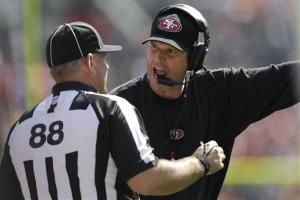 San Francisco 49ers head coach Jim Harbaug argues with an official during the second quarter of a game last Sunday.