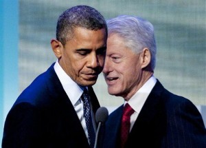 President Barack Obama steps to the microphone after being introduced by former President Bill Clinton.