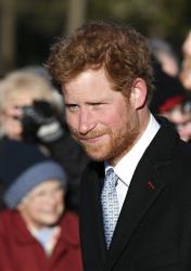 Britain's Prince Harry arrives to attend a Christmas Day Service at St. Mary's church on the grounds of Sandringham Estate, the Queen's royal estate in Norfolk, England, Wednesday, Dec. 25, 2013.