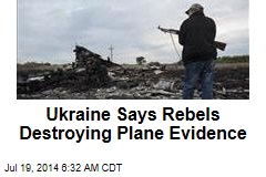 Ukraine Says Rebels Destroying Plane Evidence