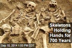 Skeletons Holding Hands for 700 Years