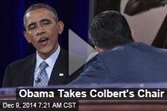 Obama Takes Colbert's Chair