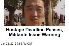 Hostage Deadline Passes, Militants Issue Warning