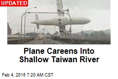 Plane Careens Into Shallow Taiwan River